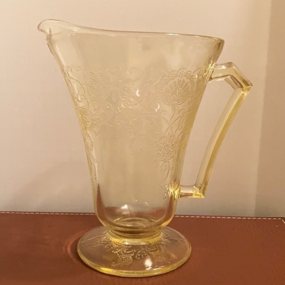 Vintage pale lemon color embossed floral designed depression glass pitcher
